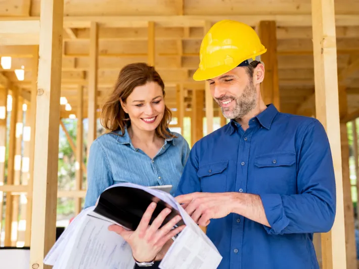 Los Angeles contractor reviewing construction plans for remodeling ADU home addition and property improvement project