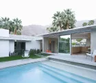 Room additions in Los Angeles showing a modern poolside home expansion with updated kitchen and living spaces